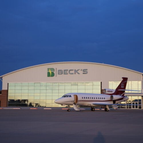 Powerlift Doors, Beck's Seed, Glass Hydraulic door, airplane hangar door.