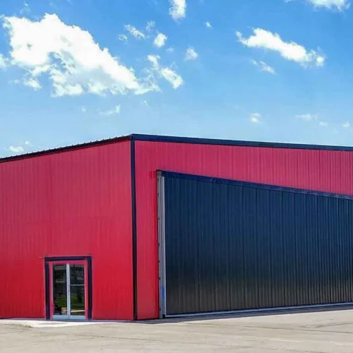 https://powerliftdoors.com/wp-content/uploads/2022/05/Hangar-retrofit-2-54-x-16-hangar-doors-PA-post-PS-reduced-for-website-14A-500x500.jpg.webp