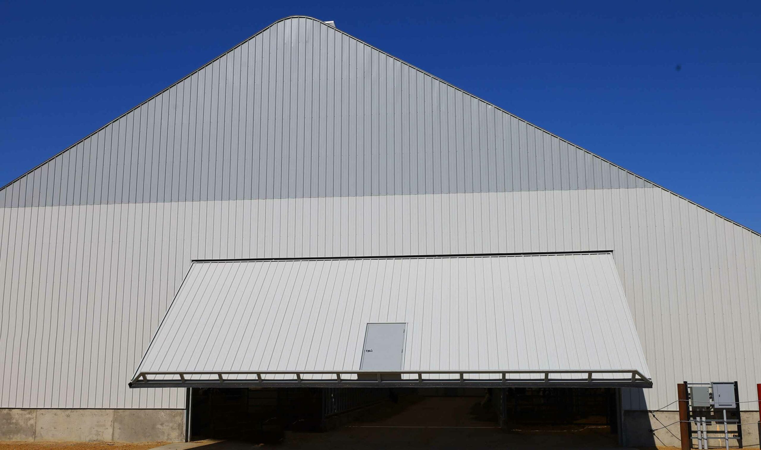 Fabric Freestall Barn, Two 40′ x 20′ PowerLift Doors
