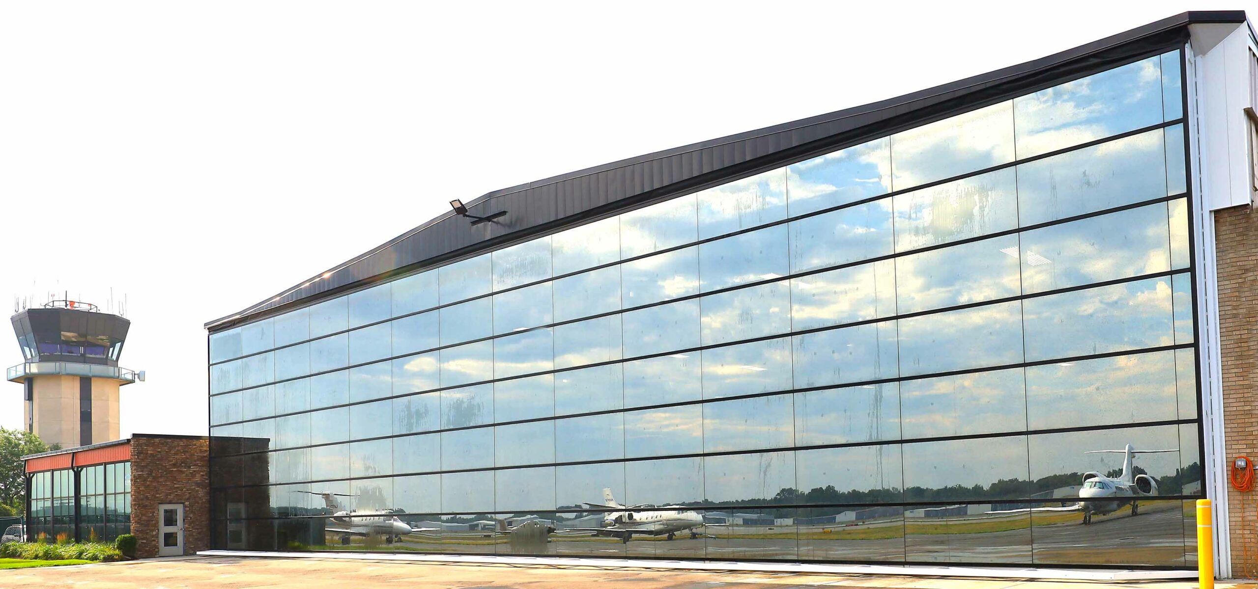 PowerLift Builds (Once Again!) World’s Largest Glass Hangar Door