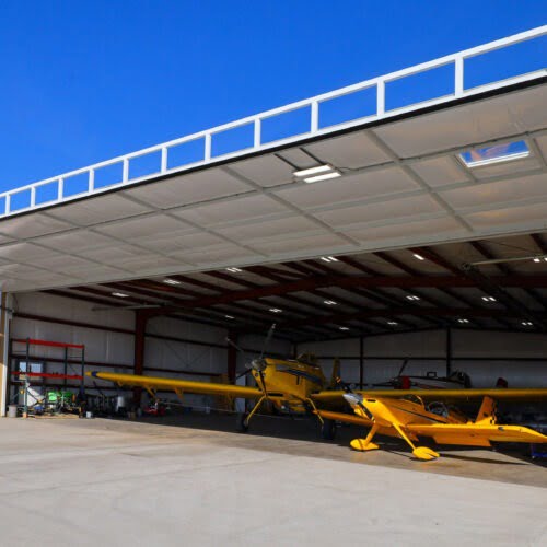 AIRPLANE HANGAR DOORS, POWERLIFT HANGAR DOORS, ROLL UP,