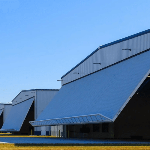Massive Access: Five PowerLift Doors, 540′ Clear Width
