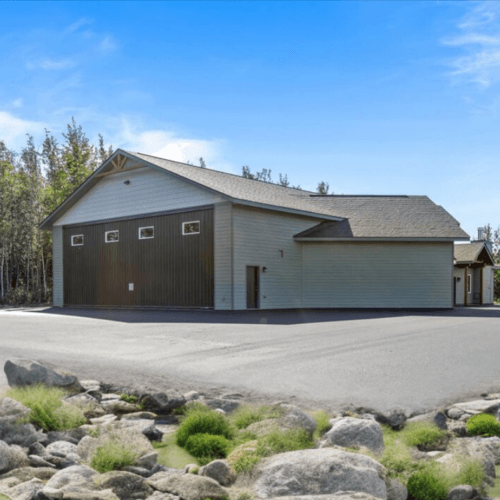 Custom Hangar Haven: Elevate Your Space with Powerlift Hydraulic Doors