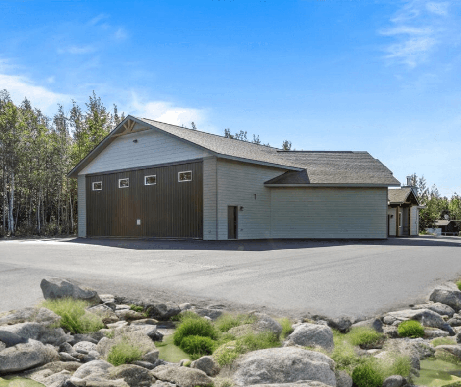 Custom Hangar Haven: Elevate Your Space with Powerlift Hydraulic Doors