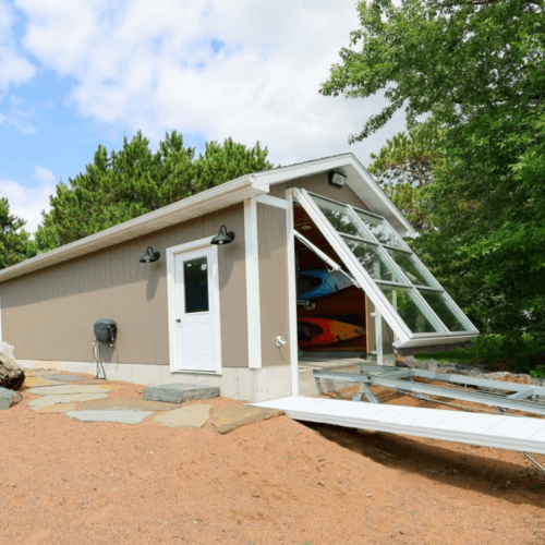 Crystal Clear Access: All-Glass PowerLift Doors for Boathouses