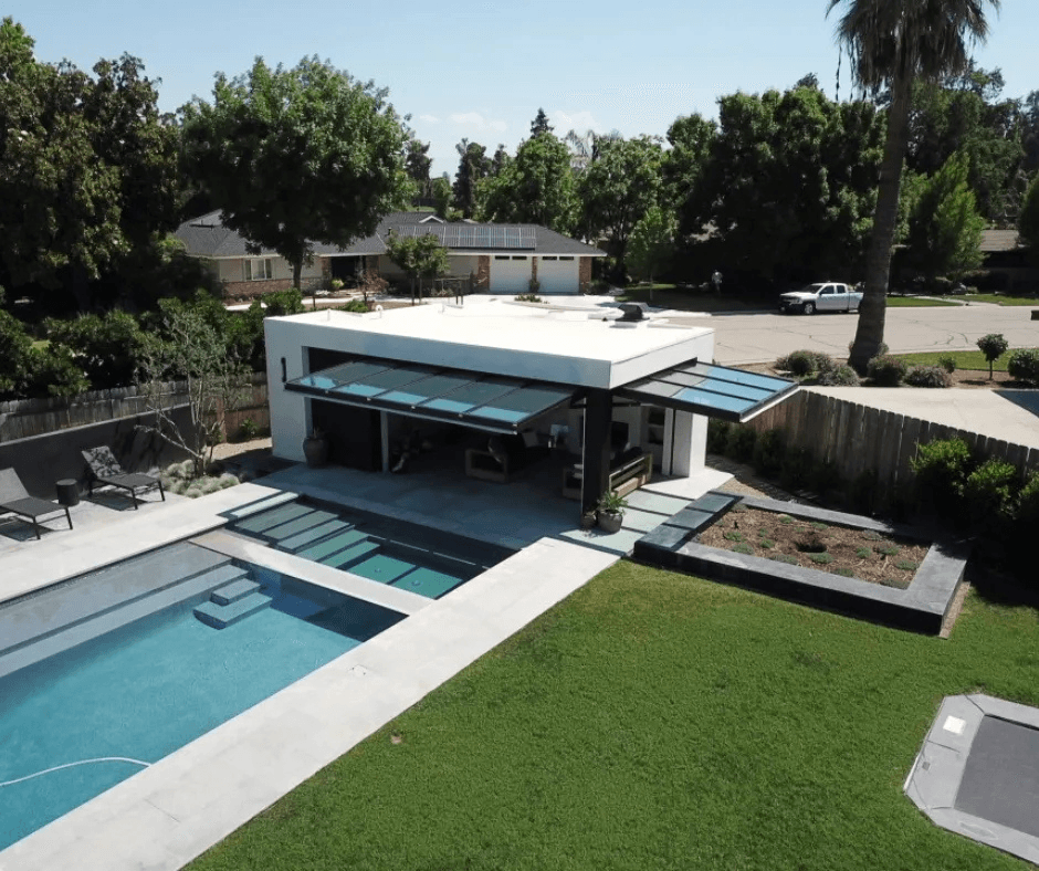 Serene Luxury: The Glass-Walled Pool House