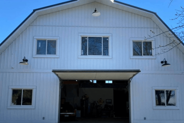 "Barndominium Bliss: Wide Open Living with a 16'x12' PowerLift Door!