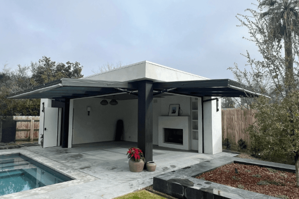 Serene Luxury: The Glass-Walled Pool House