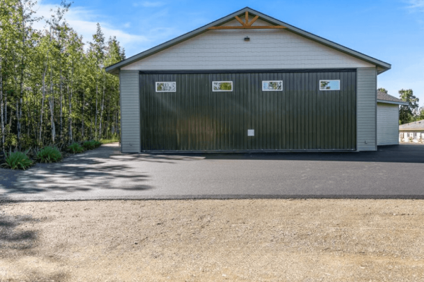 Custom Hangar Haven: Elevate Your Space with Powerlift Hydraulic Doors