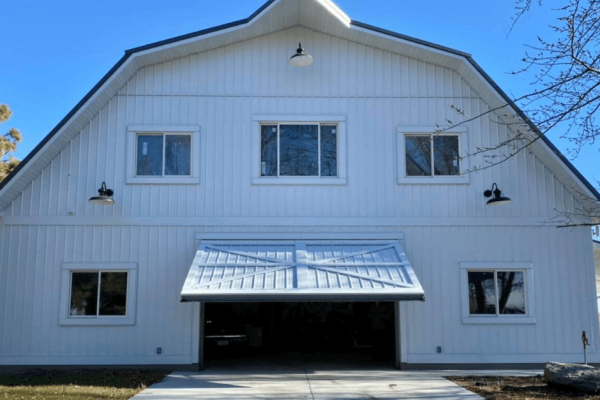 "Barndominium Bliss: Wide Open Living with a 16'x12' PowerLift Door!"