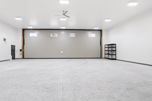 Custom Hangar Haven: Elevate Your Space with Powerlift Hydraulic Doors