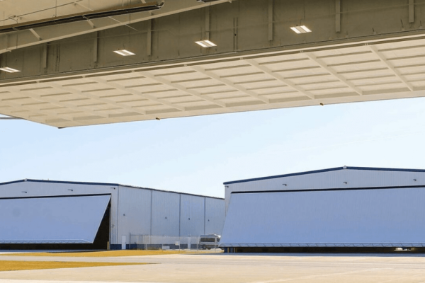 Massive Access: Five PowerLift Doors, 540′ Clear Width