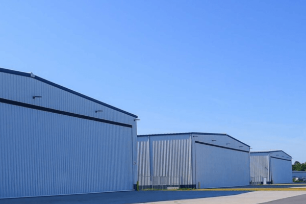 Massive Access: Five PowerLift Doors, 540′ Clear Width