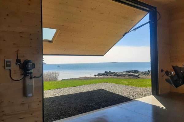 Boathouse on ocean w 18' x 16' Plift wood doors NB post PS resized for website (5)