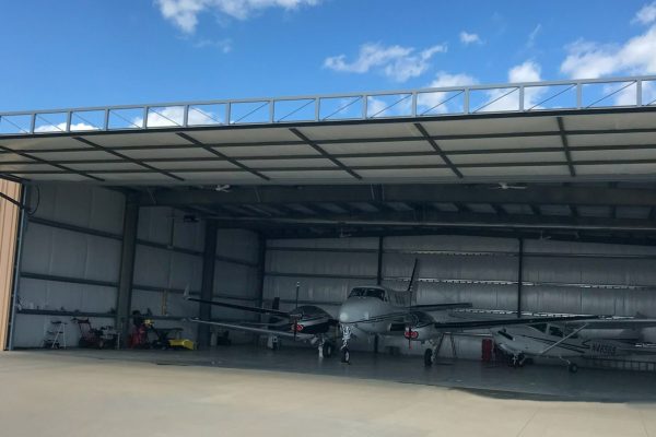 Hangar w new 60' x 16' PLift OH post PS resized for website (1)